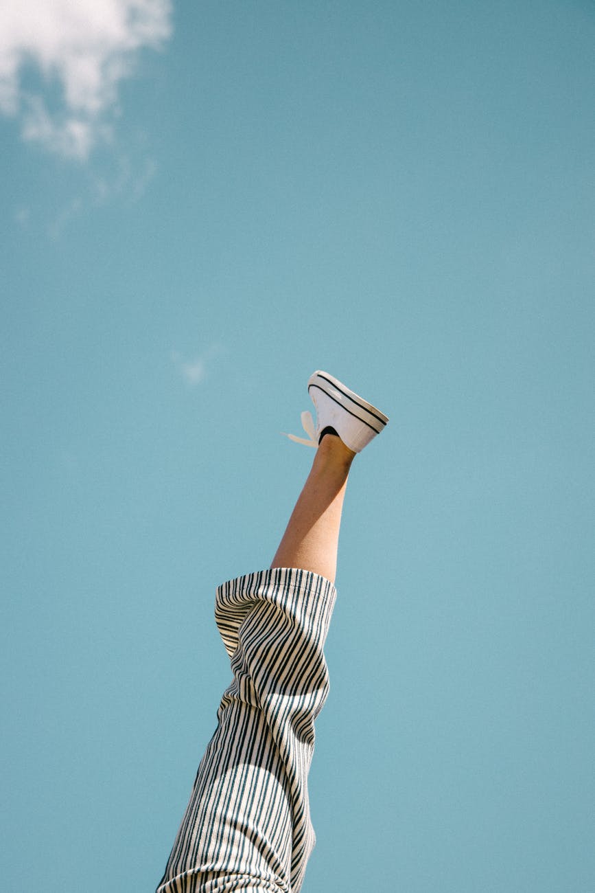 a person with foot up in the air